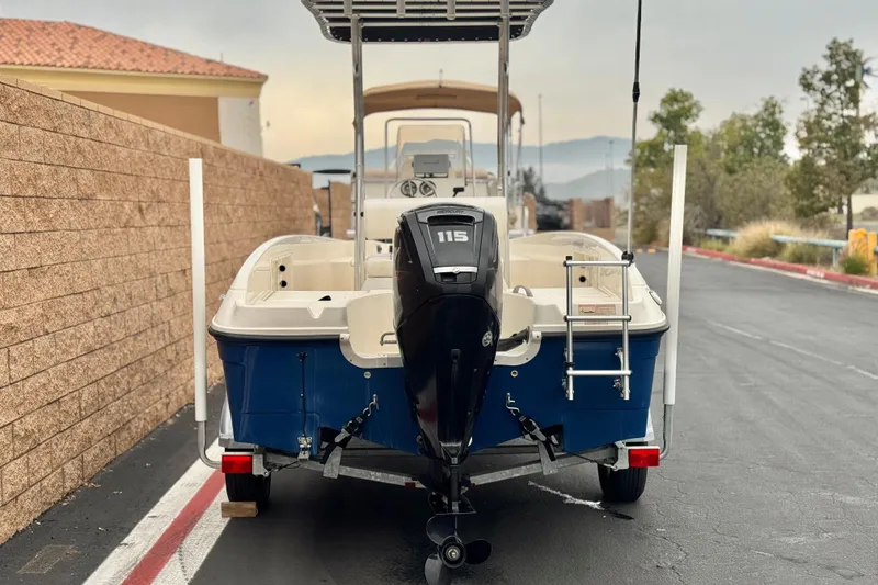 Slide: The Image of 2017 Bayliner Element F18 boat with 115 HP engine on trailer. - 4