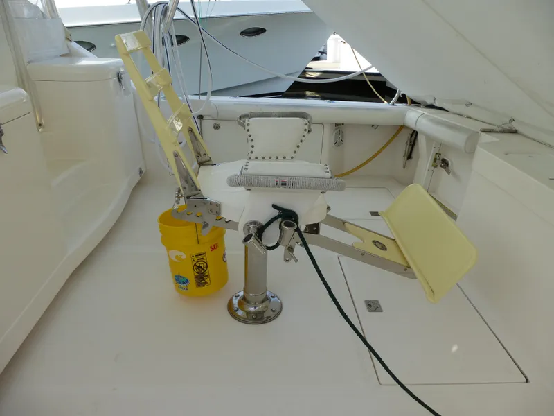 Slide: The Image of 2005 Cabo 40 Express yacht deck with ocean view and city skyline. - 17