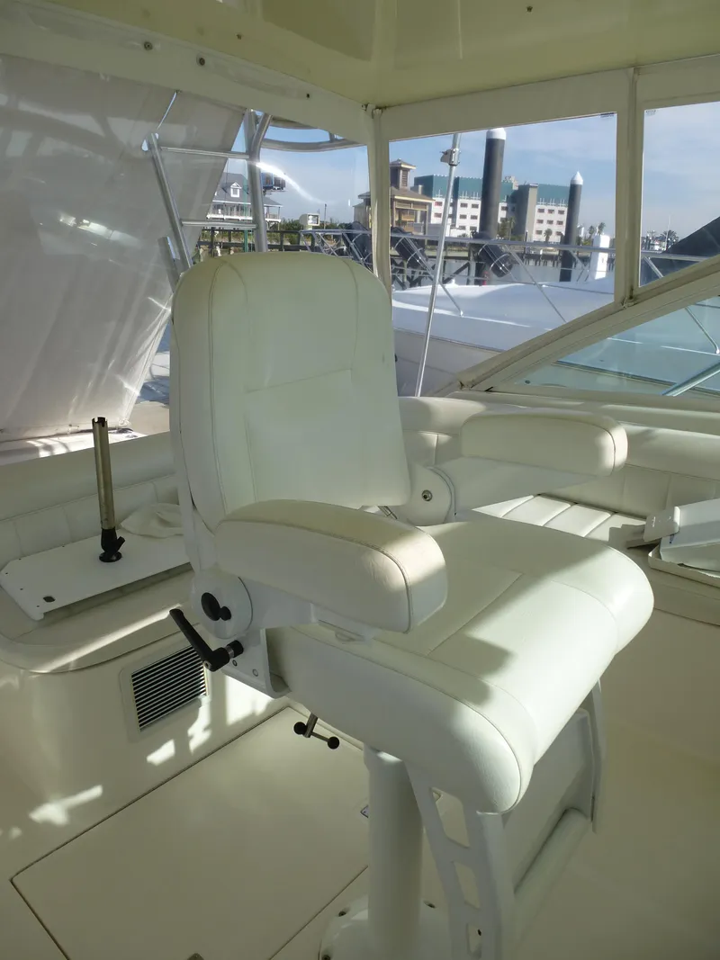 Slide: The Image of 2005 Cabo 40 Express boat deck with ocean view and city skyline. - 22