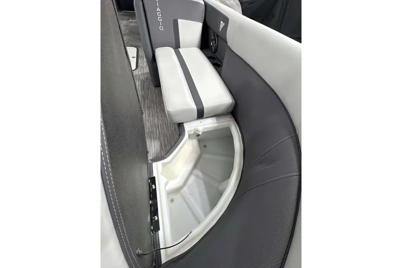 Slide: The Image of 2026 Viaggio x22u boat interior with storage compartment and cushioned seating. - 18