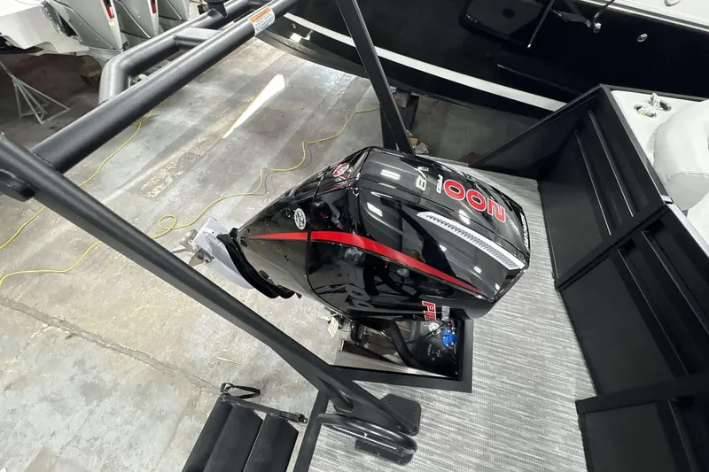 Slide: The Image of 2026 Viaggio x22u boat with powerful black and red outboard motor. - 23