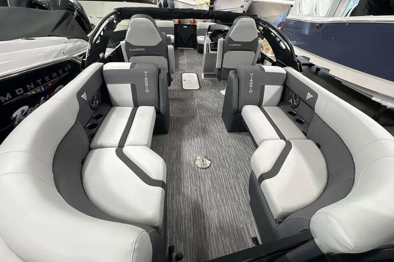 Slide: The Image of Luxurious 2026 Viaggio x22u boat interior with sleek gray seating and modern design. - 6