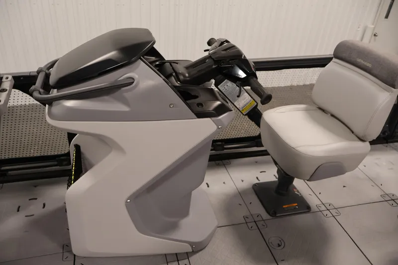 Slide: The Image of 2024 Sea-Doo Switch 19 helm with steering controls and comfortable seating. - 15