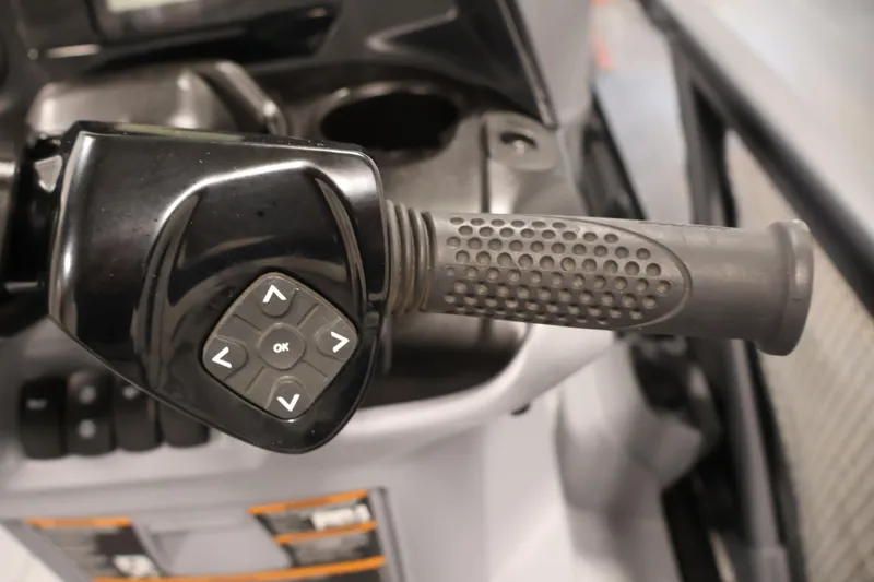 Slide: The Image of Control panel of 2024 Sea-Doo Switch 19 with four black switches. - 18