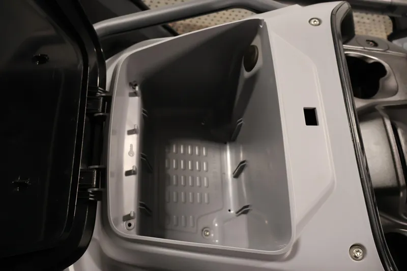 Slide: The Image of 2024 Sea-Doo Switch 19 dashboard with digital display and cup holders. - 20