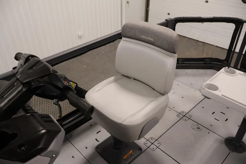 Slide: The Image of 2024 Sea-Doo Switch 19 seating with under-seat storage compartments. - 23