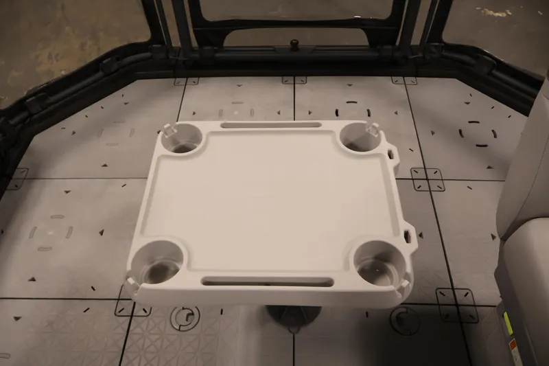 Slide: The Image of 2024 Sea-Doo Switch 19 interior with steering and seating area. - 26