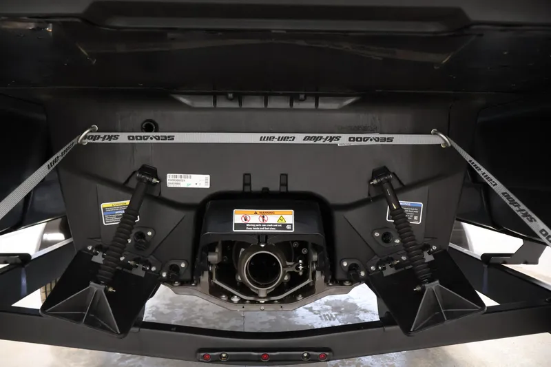 Slide: The Image of 2024 Sea-Doo Switch 19 interior with seating and steering console in a garage setting. - 27