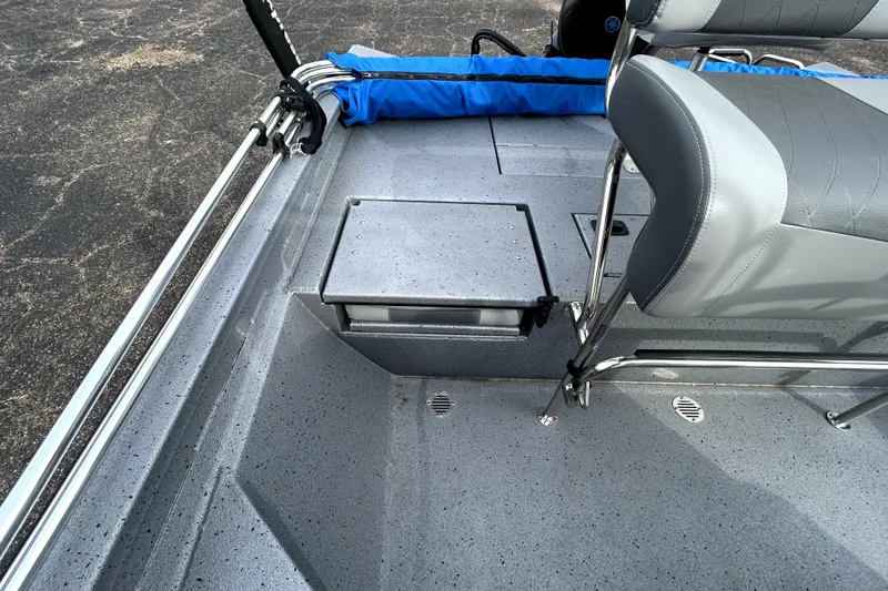 Slide: The Image of 2025 Xpress H20B Bay boat interior with seating and storage compartments. - 31