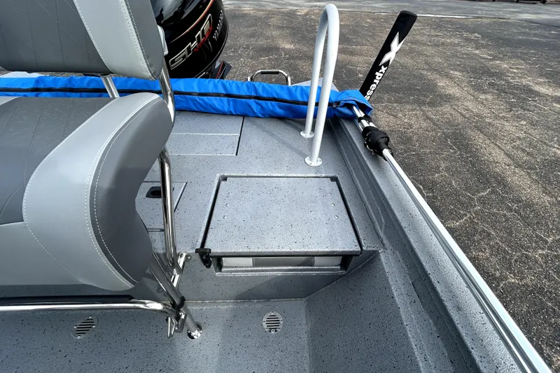 Slide: The Image of 2025 Xpress H20B Bay boat interior with seating and storage compartments. - 34
