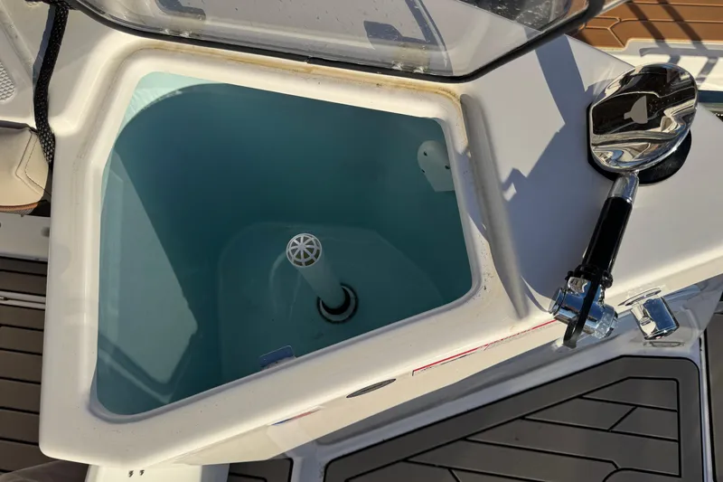 Slide: The Image of Livewell on 2025 Cutwater C-288 Coupe boat, featuring a sleek design and modern amenities. - 29