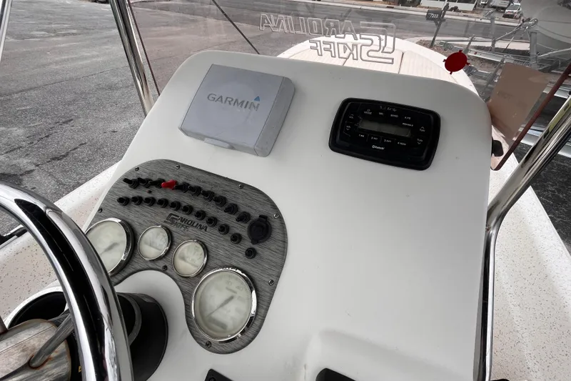 Slide: The Image of 2019 Carolina Skiff 20 JVX CC boat console with Garmin navigation and control panel. - 8