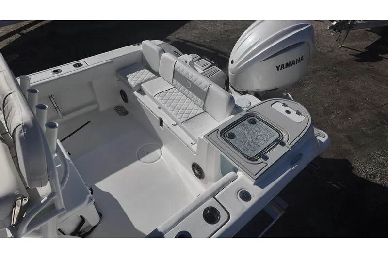Slide: The Image of Sea Fox boat interior with Yamaha engine, featuring seating and storage compartments. - 13