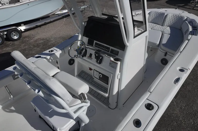 Slide: The Image of Interior view of a Sea Fox boat with steering console and seating. - 5