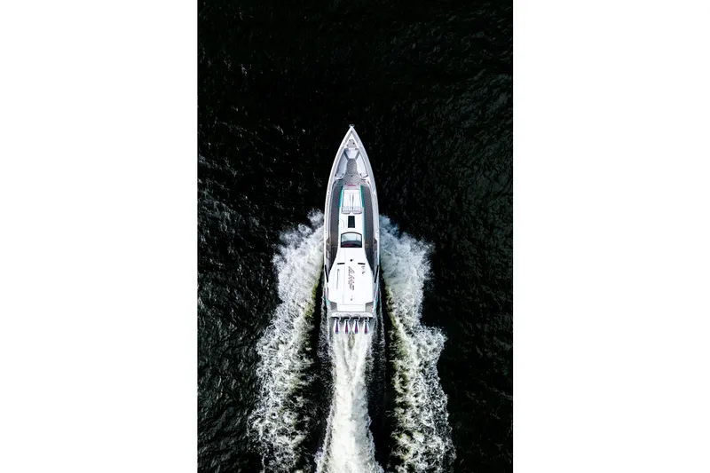 Slide: The Image of Aerial view of AMP 443 boat cruising on water, 2025 model. - 12