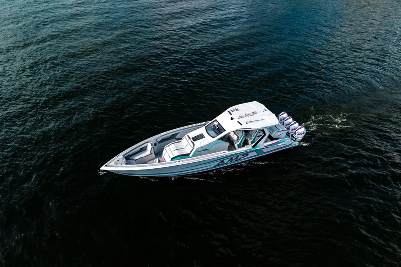Slide: The Image of Aerial view of 2025 AMP 443 boat cruising on open water. - 30
