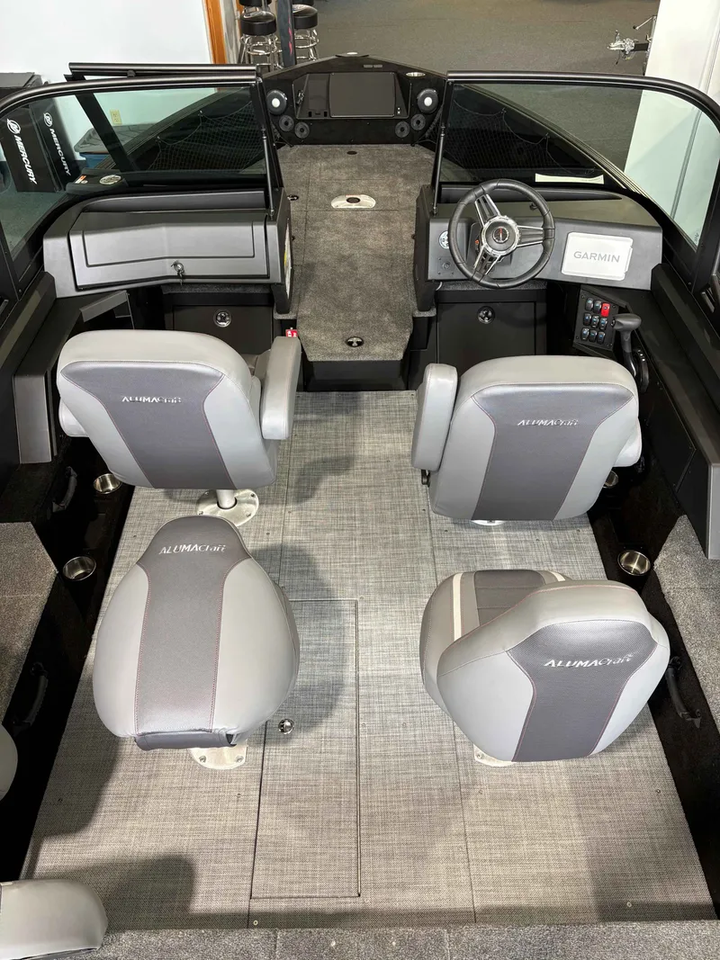 Slide: The Image of Interior of 2026 Alumacraft COMP 185X/SP with four gray seats. - 5