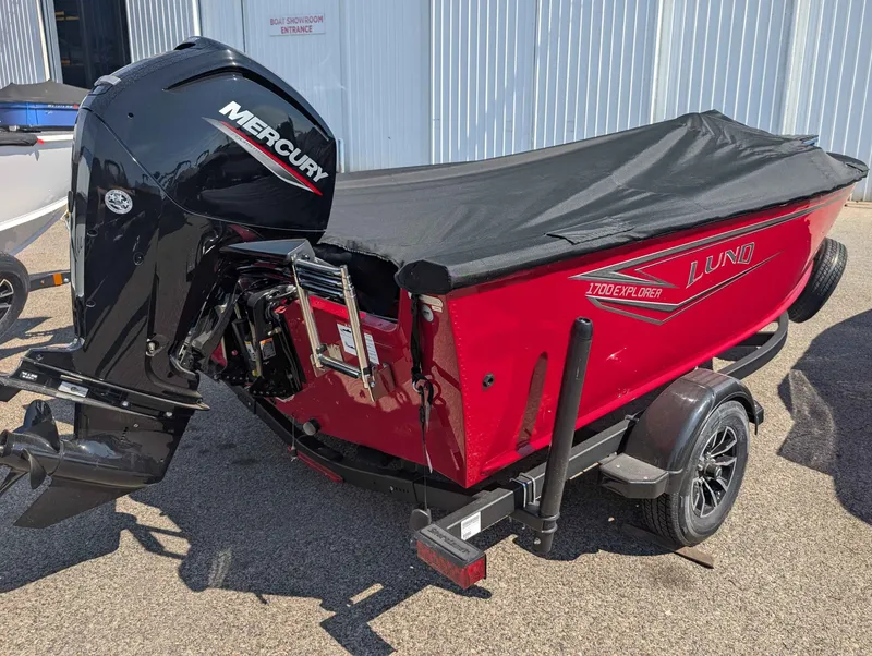 Slide: The Image of Red 2026 Lund 1700 EXP/SS boat with Mercury engine. - 10