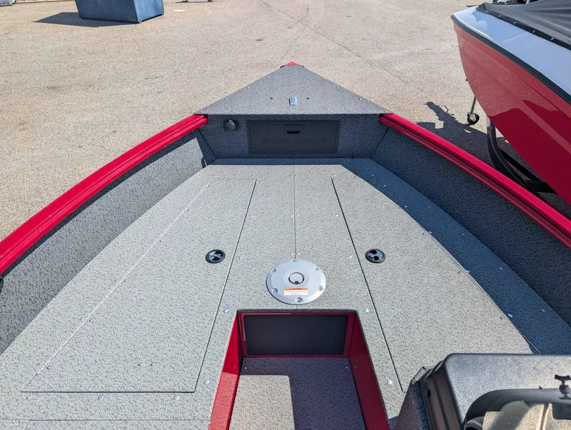 Slide: The Image of Lund 1700 EXP/SS 2026 boat, gray and red deck area. - 3