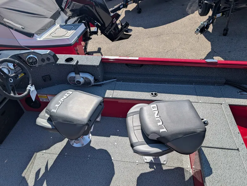 Slide: The Image of Interior of a 2026 Lund 1700 EXP/SS boat with two seats. - 8