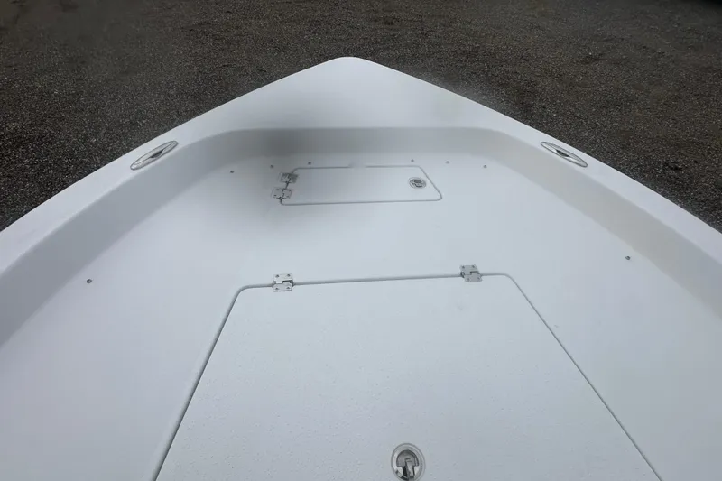 Slide: The Image of 2026 Action Craft 22 Bay boat deck with storage compartments. - 21