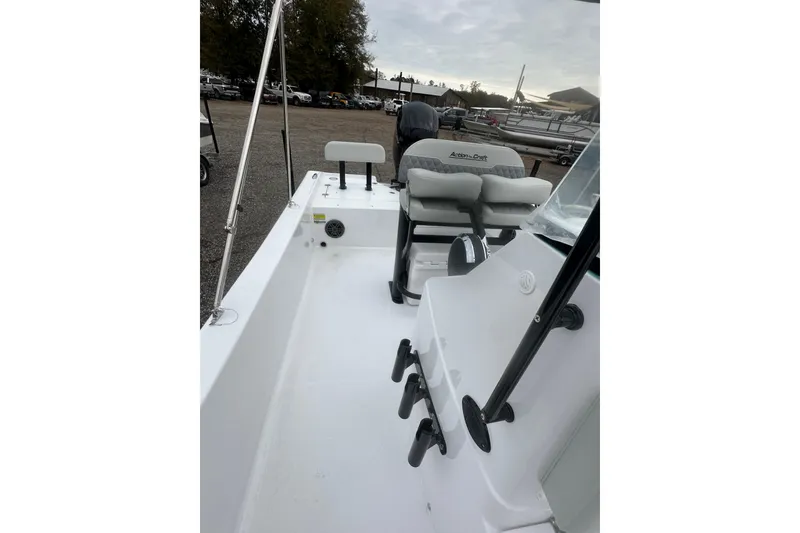 Slide: The Image of 2026 Action Craft 22 Bay boat interior with seating and rod holders. - 24