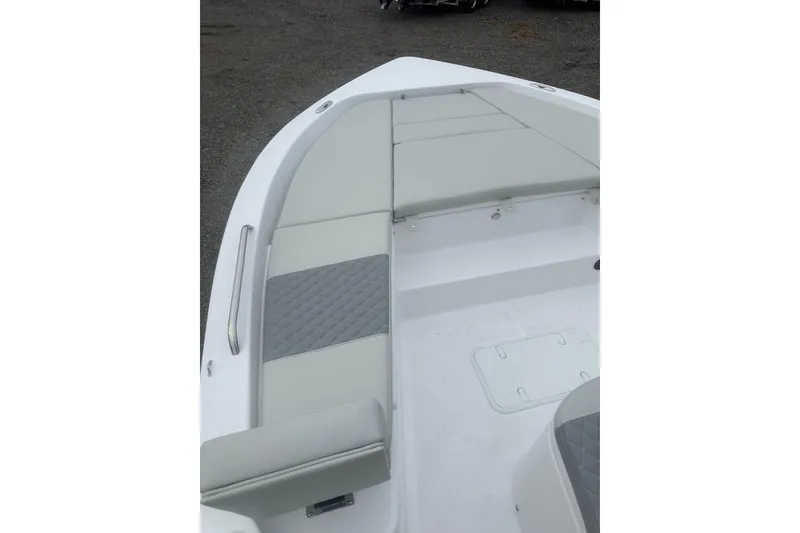 Slide: The Image of 2026 Action Craft 22 Bay boat interior with cushioned seating and storage compartments. - 36