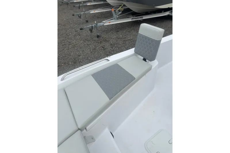 Slide: The Image of 2026 Action Craft 22 Bay boat seat with gray diamond-pattern upholstery. - 37