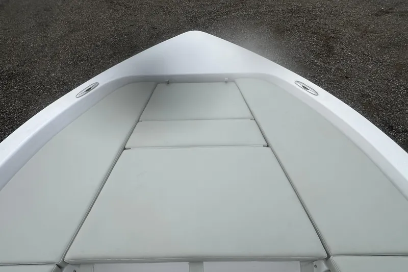 Slide: The Image of Bow view of 2026 Action Craft 22 Bay boat with cushioned seating. - 39
