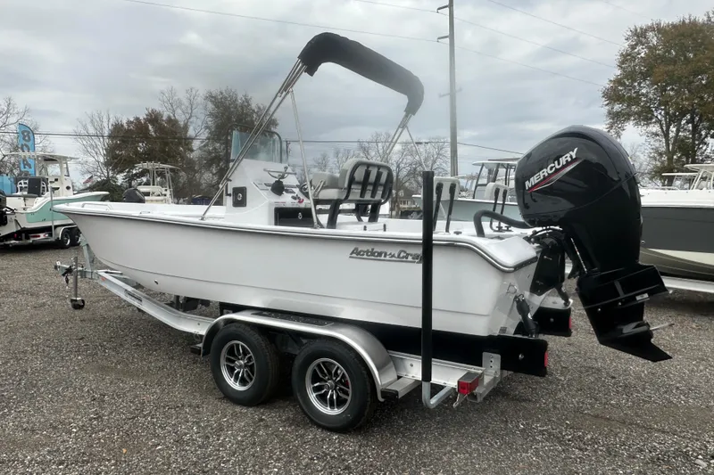 Slide: The Image of 2026 Action Craft 22 Bay boat with Mercury engine on trailer. - 5