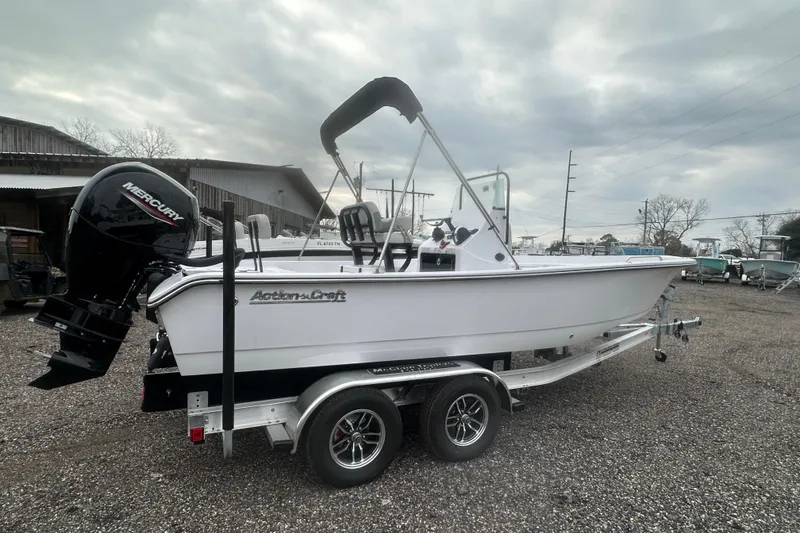 Slide: The Image of 2026 Action Craft 22 Bay boat on trailer with Mercury outboard motor. - 9