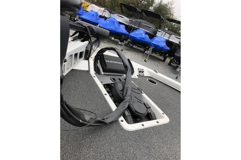 Slide: The Image of 2025 Vexus AVX1980 boat deck with Humminbird electronics and fishing gear. - 5