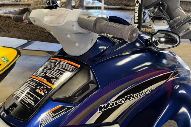 Slide: The Image of 2013 Yamaha WaveRunner VX Cruiser, blue with detailed handlebar and logo. - 10