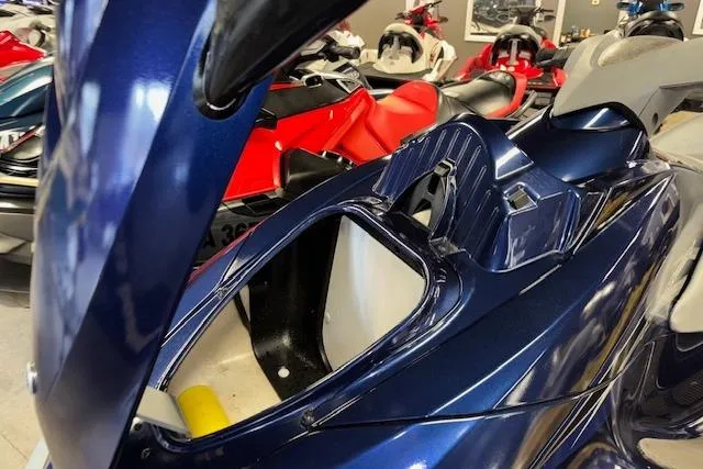 Slide: The Image of 2013 Yamaha WaveRunner VX Cruiser, blue, open storage compartment, indoor showroom. - 13