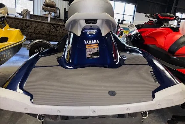 Slide: The Image of 2013 Yamaha WaveRunner VX Cruiser, blue, rear view in a showroom. - 8