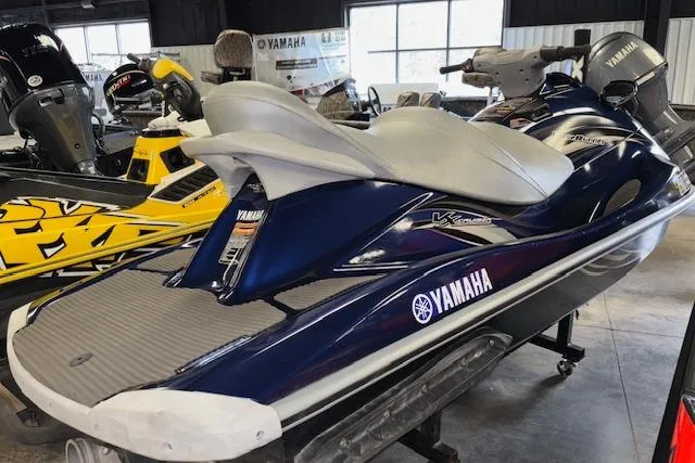 Slide: The Image of 2013 Yamaha WaveRunner VX Cruiser in showroom, blue and white design. - 9