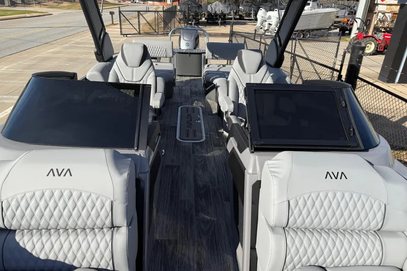 Slide: The Image of 2026 Avalon Excalibur LTD Quad Lounge Windshield boat with luxurious seating and modern design. - 11