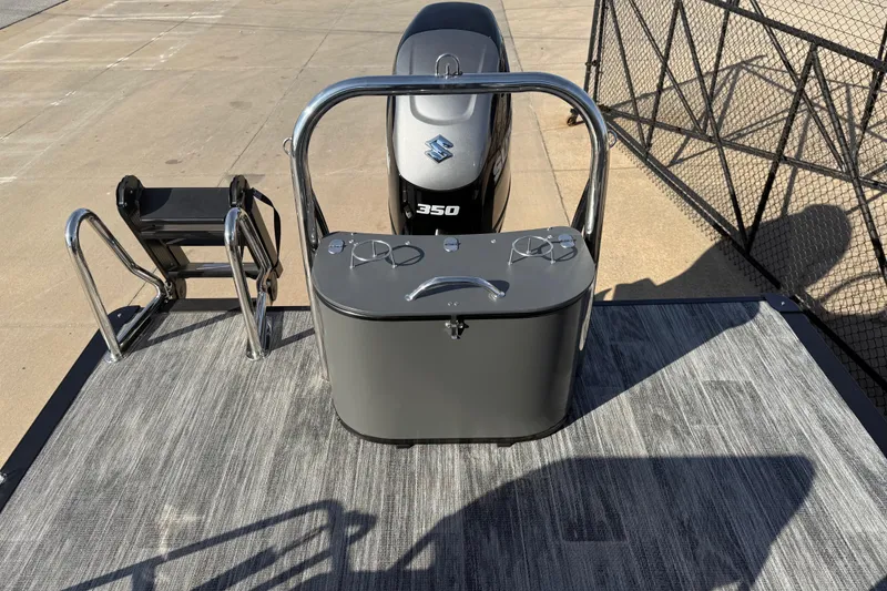 Slide: The Image of 2026 Avalon Excalibur LTD Quad Lounge Windshield boat with Suzuki 350 engine on deck. - 18