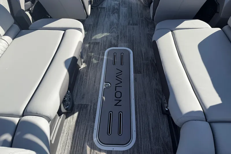 Slide: The Image of Interior of 2026 Avalon Excalibur LTD Quad Lounge with gray seating and flooring. - 27