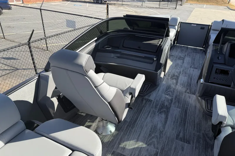 Slide: The Image of 2026 Avalon Excalibur LTD Quad Lounge Windshield interior with modern seating and flooring. - 28