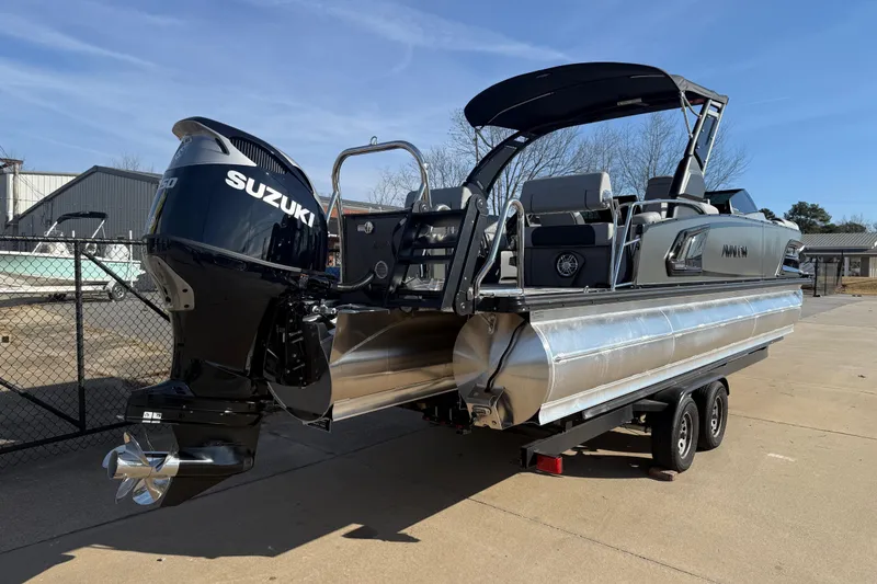 Slide: The Image of 2026 Avalon Excalibur LTD Quad Lounge Windshield pontoon boat with Suzuki engine. - 3