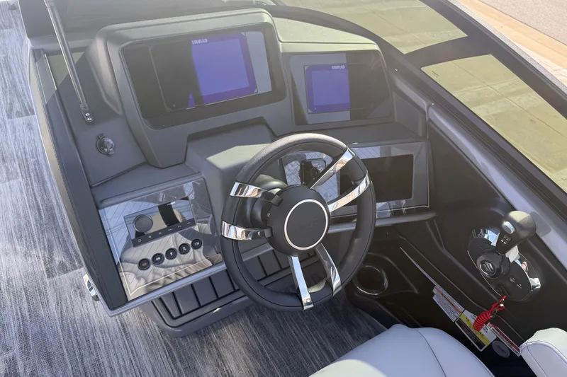 Slide: The Image of 2026 Avalon Excalibur LTD Quad Lounge Windshield dashboard with modern controls and steering wheel. - 30