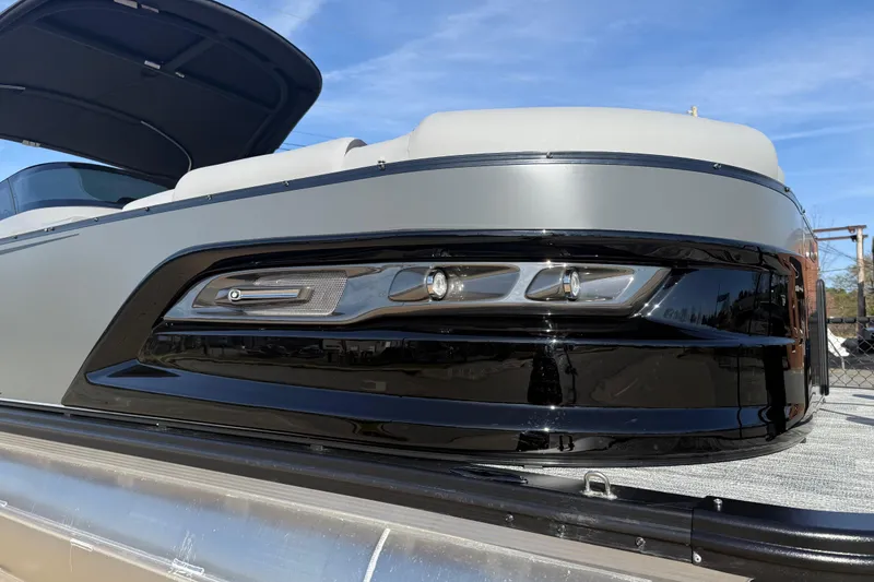 Slide: The Image of 2026 Avalon Excalibur LTD Quad Lounge Windshield boat, sleek design, close-up view. - 41