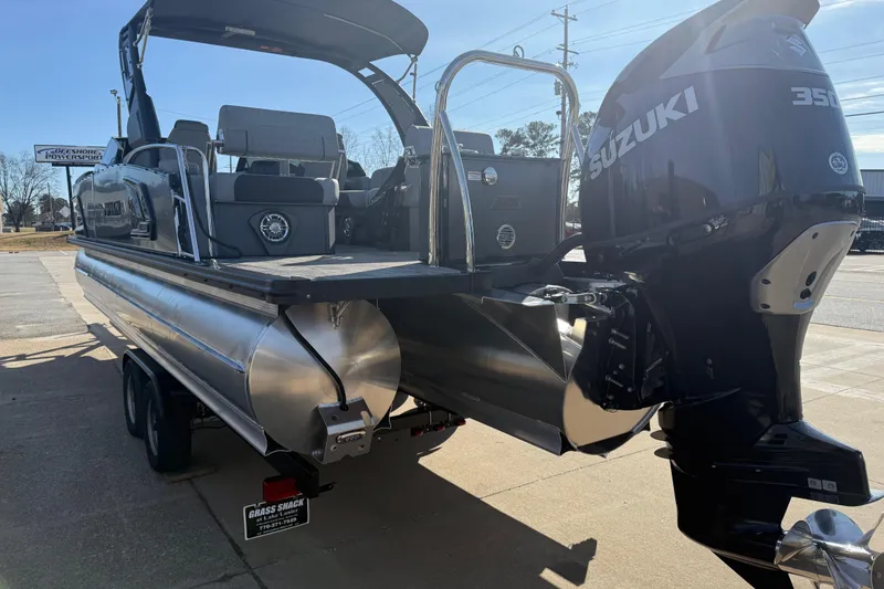 Slide: The Image of 2026 Avalon Excalibur LTD Quad Lounge Windshield pontoon boat with Suzuki 350 outboard motor. - 5