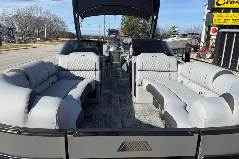 Slide: The Image of 2026 Avalon Excalibur LTD Quad Lounge Windshield boat with luxurious seating and modern design. - 8