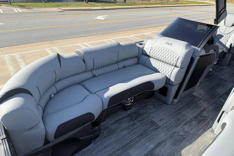 Slide: The Image of Luxurious seating in 2026 Avalon Excalibur LTD Quad Lounge Windshield boat. - 9