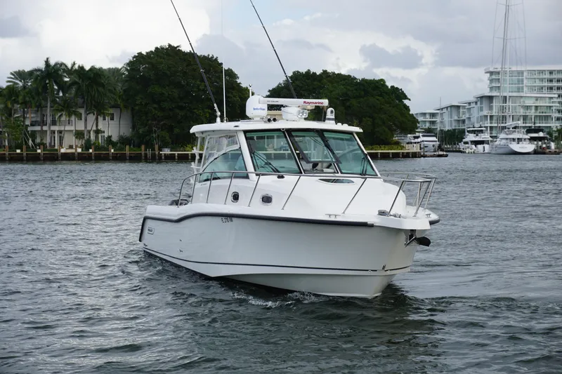 Slide: The Image of Overhead view of 2015 Boston Whaler 345 Conquest boat on water. - 16