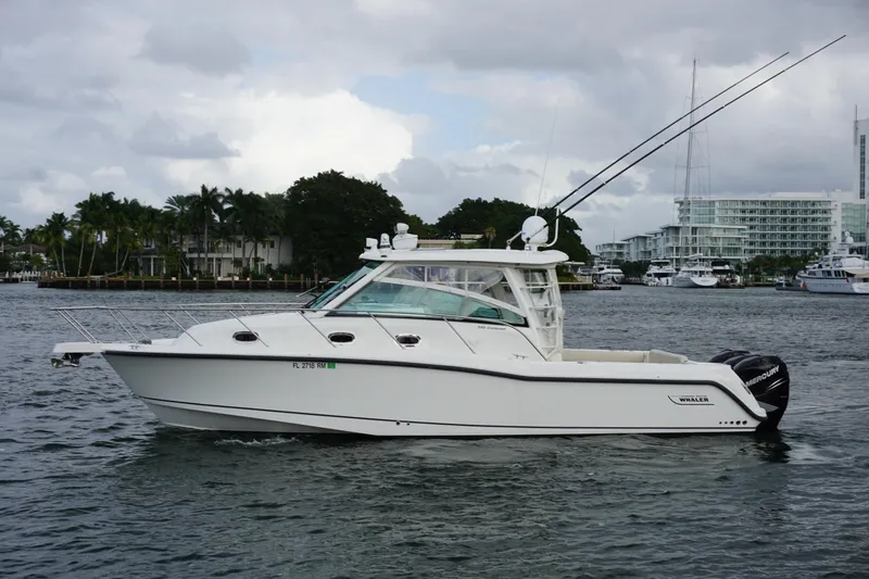 Slide: The Image of Luxurious interior of 2015 Boston Whaler 345 Conquest with TV and seating area. - 23