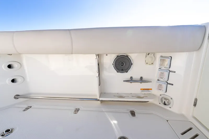 Slide: The Image of 2015 Boston Whaler 345 Conquest boat interior with speaker and control panel. - 34