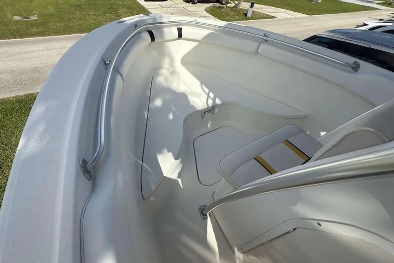 Slide: The Image of 2003 Hydra-Sports Vector 2400 CC boat interior with seating and railings. - 20